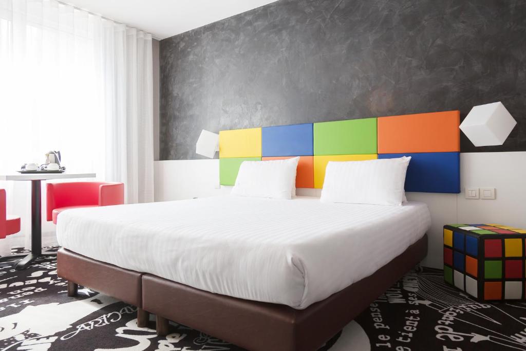 Postel nebo postele na pokoji v ubytování Hotel Tristar