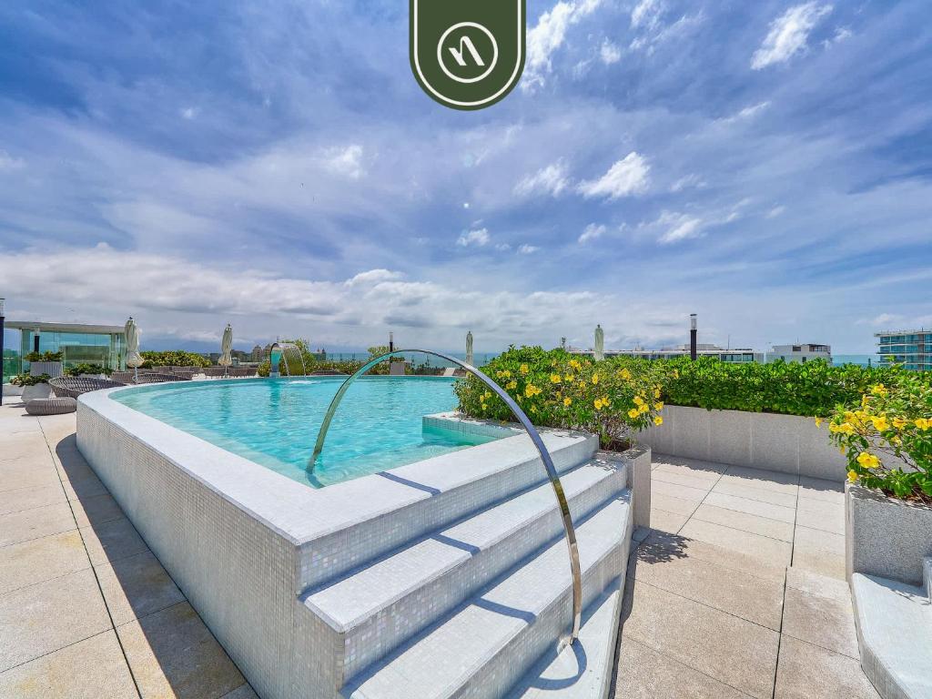 a swimming pool on top of a building at Luxury 3 BR Condo - Beach Access 1 Block Away in Bucerías