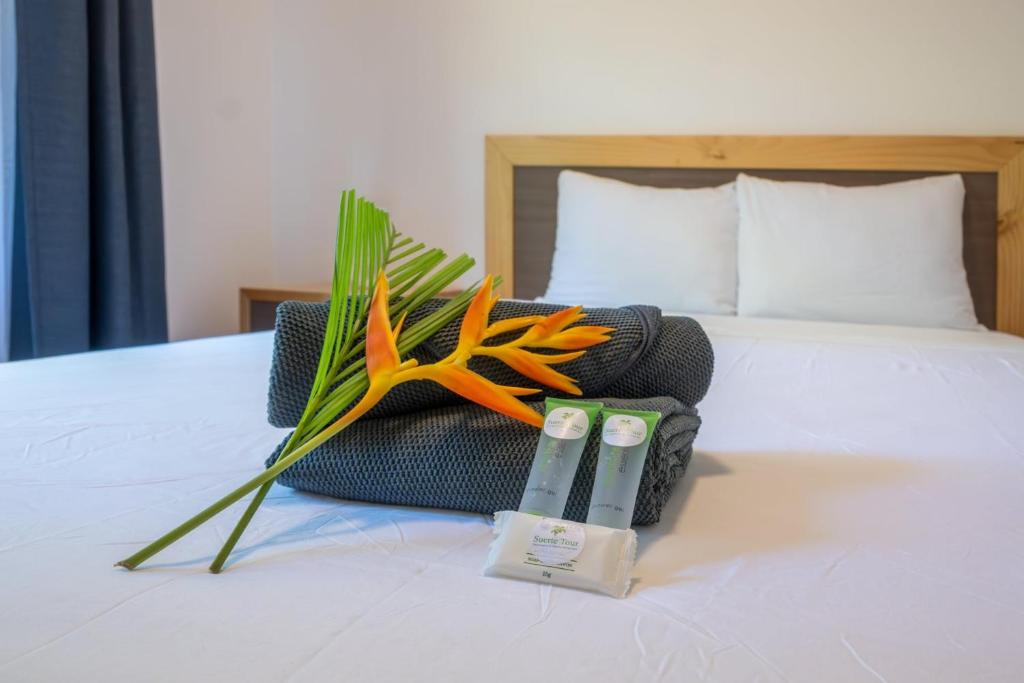 Ένα ή περισσότερα κρεβάτια σε δωμάτιο στο Villaggio 1 Apartments