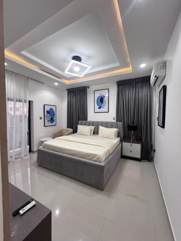 Postel nebo postele na pokoji v ubytování Sapphire Isle Apartment