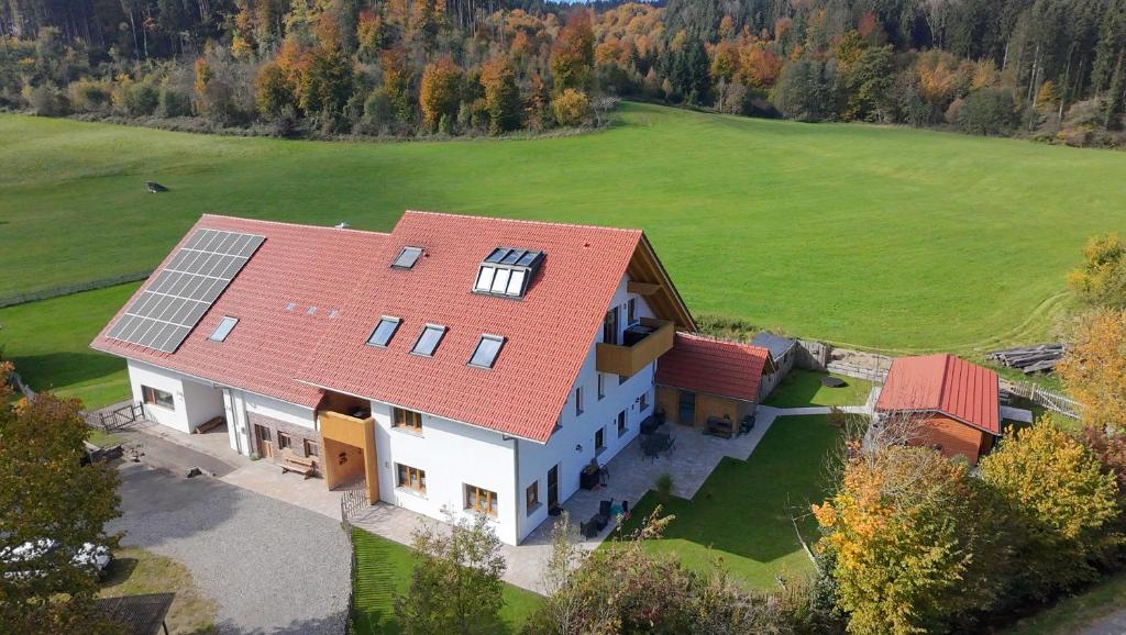 an aerial view of a house with a red roof at BaumKrone im Happy Allgäu - 2-stöckige Wohnung mit Wohnnetz in Leutkirch im Allgäu