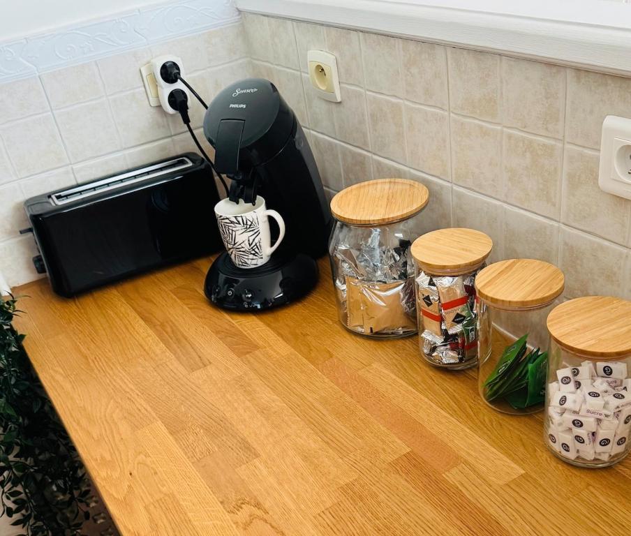 Kuchyň nebo kuchyňský kout v ubytování Chantilly Spa Lodge near Parc Asterix