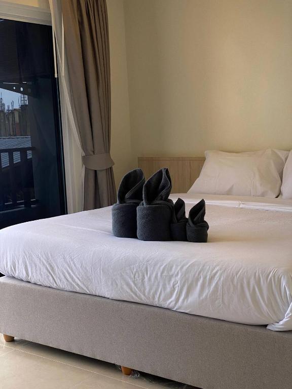 En eller flere senge i et værelse på Terraza A312 - Cozy Apartment managed by S&P