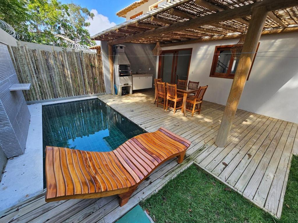 Bazén v ubytování Casa Praiana com Piscina Privativa. nebo v jeho okolí