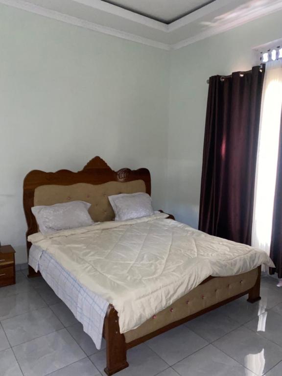 En eller flere senge i et værelse på Mz apartments