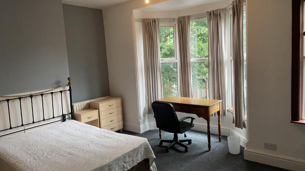 Postel nebo postele na pokoji v ubytování Wentworth Manor