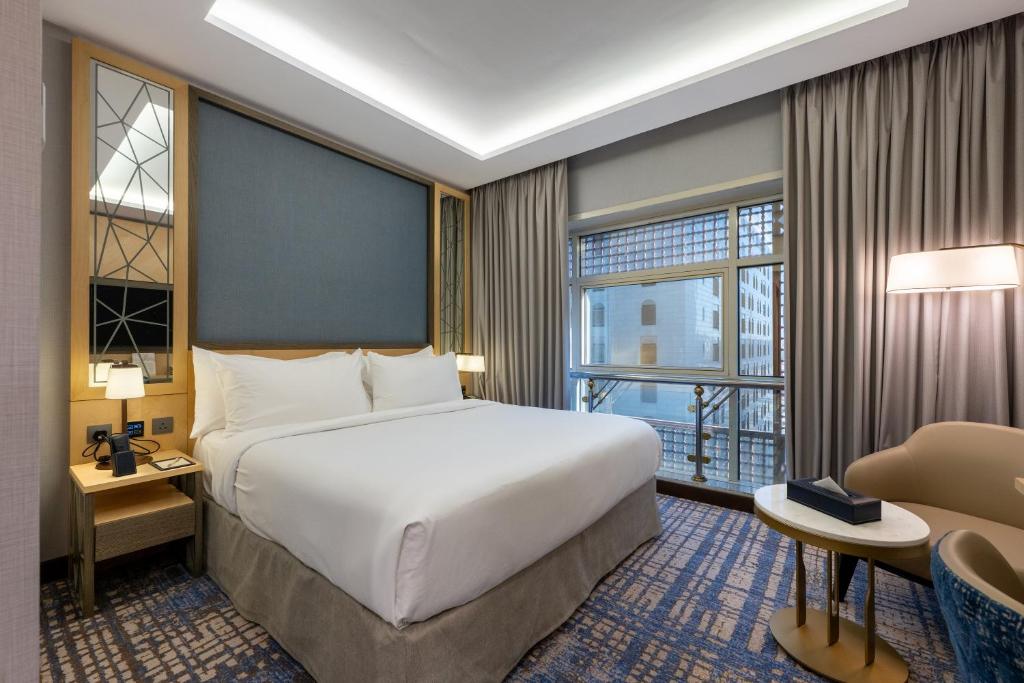 Postel nebo postele na pokoji v ubytování MADEN Al Rawda مادن الروضة