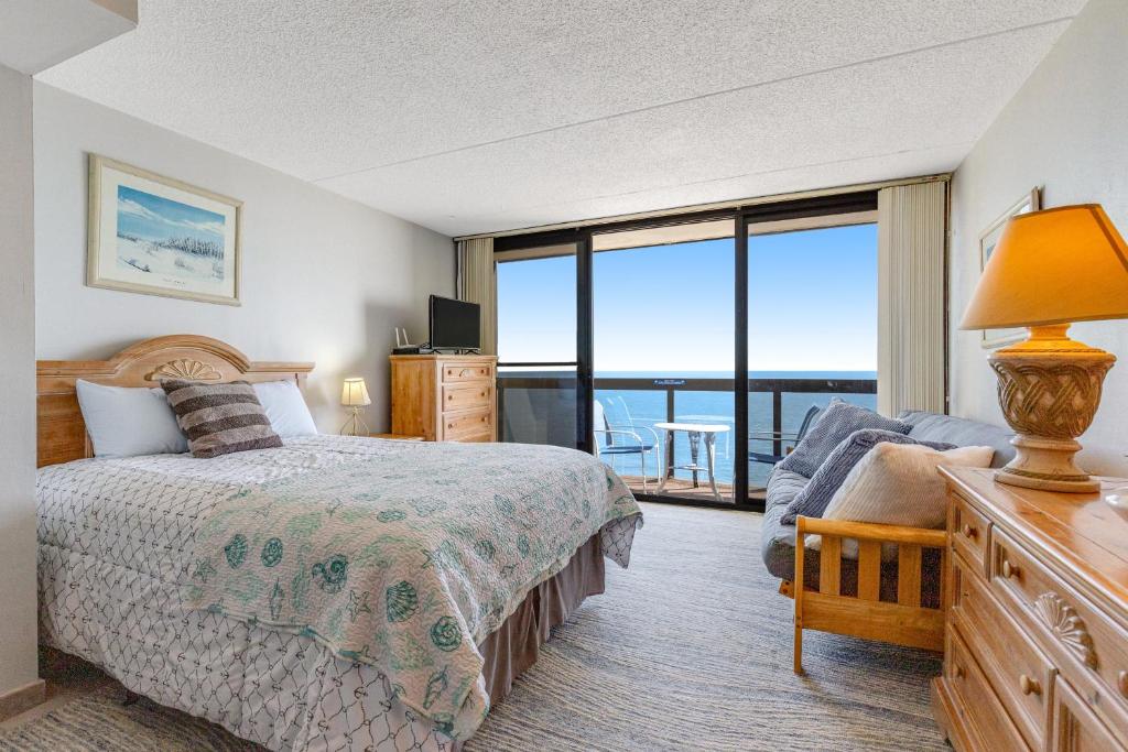 Ένα ή περισσότερα κρεβάτια σε δωμάτιο στο Golden Sands 1109