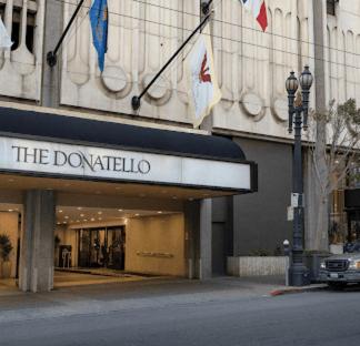 a building with a sign that reads the doorkittle at The Donatello in San Francisco