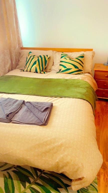 Ένα ή περισσότερα κρεβάτια σε δωμάτιο στο Maxismile Haven