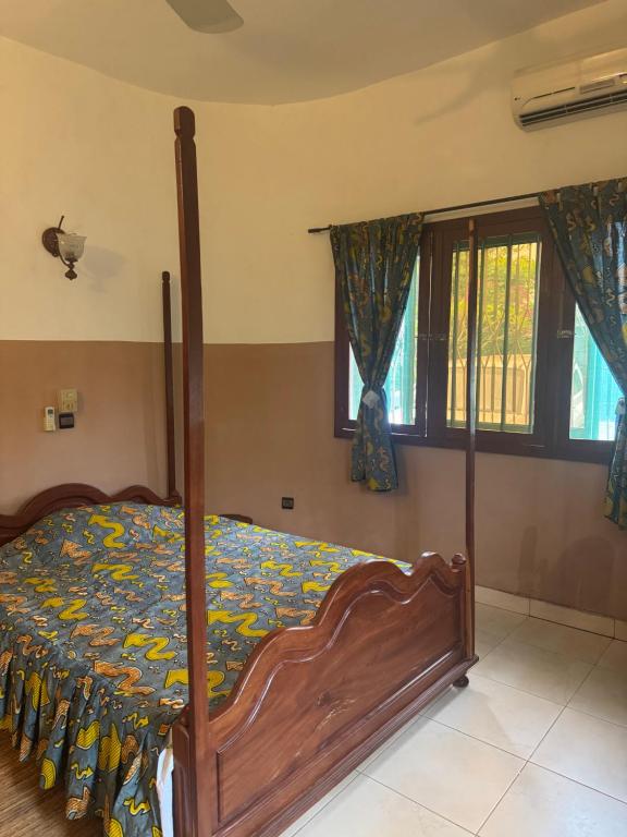 Katil atau katil-katil dalam bilik di Villa Dia Fankoué