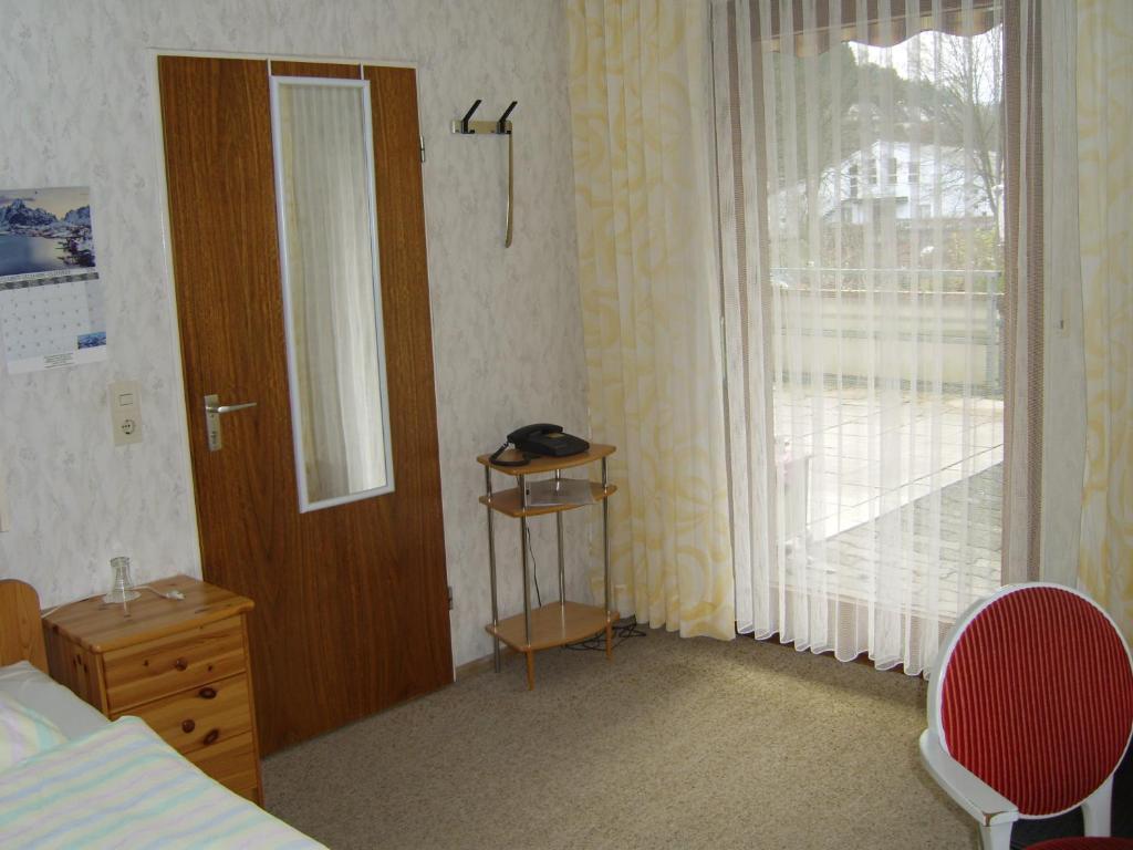 Postel nebo postele na pokoji v ubytování Haus Hubertus