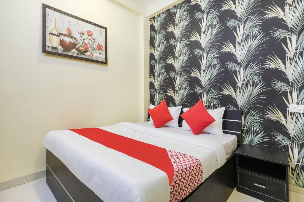 Postel nebo postele na pokoji v ubytování Hotel O The Dreams