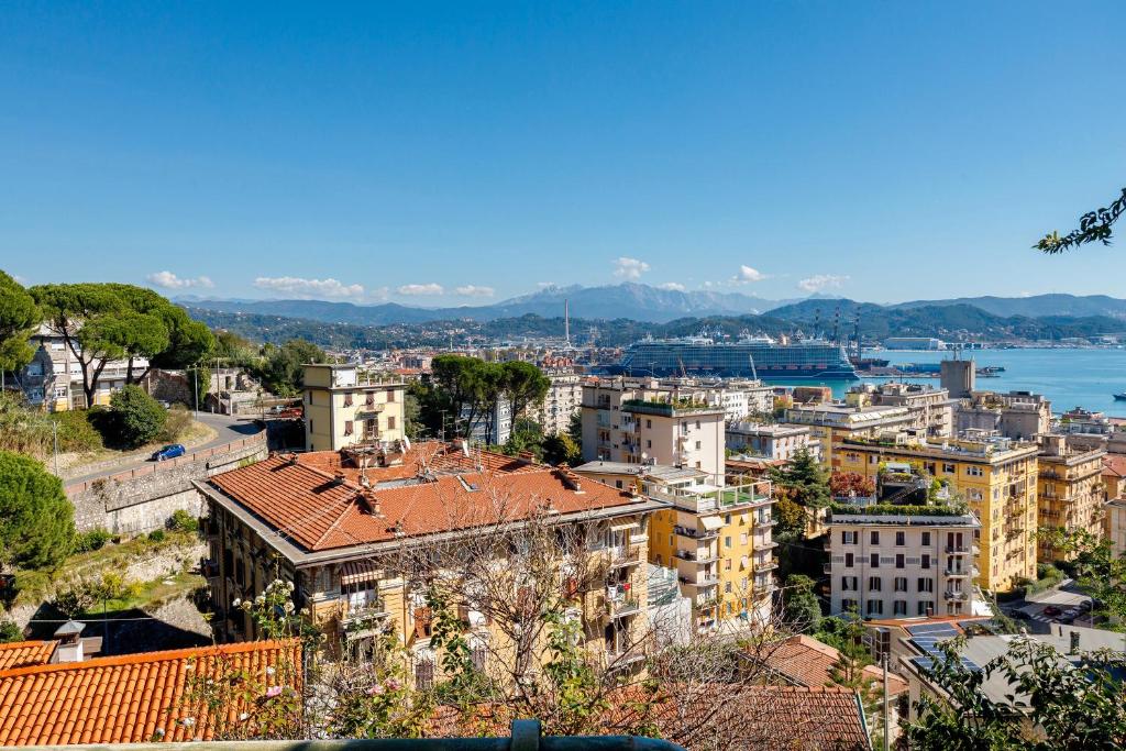 an aerial view of a city with buildings at Ca' Montello Apartment in La Spezia