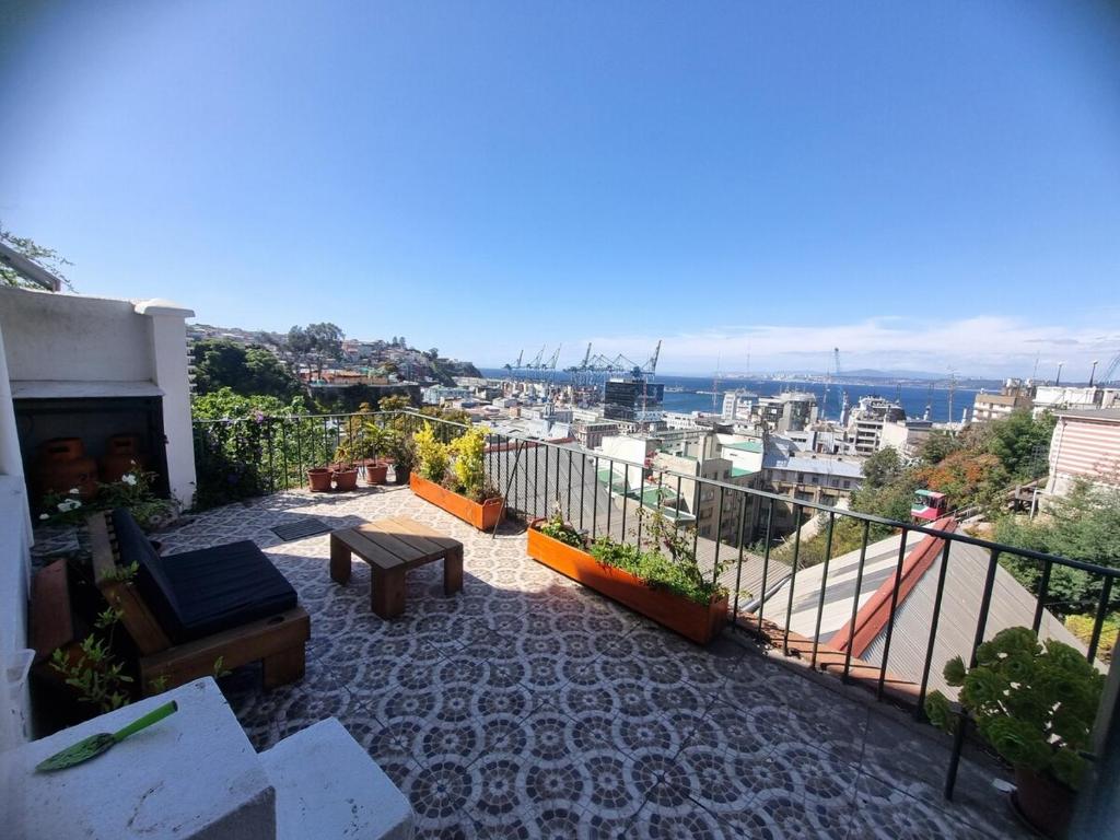 a balcony with a view of a city at Comfortable and family house in Cerro Alegre in Valparaíso