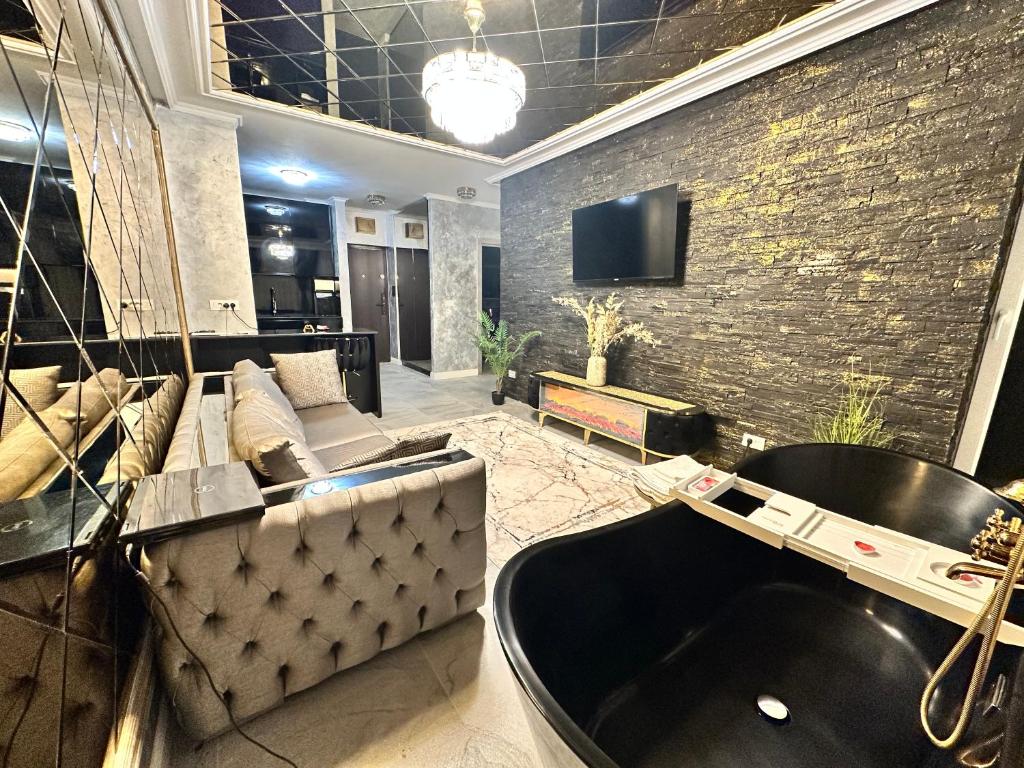 TV a/nebo společenská místnost v ubytování Apartament Green Park