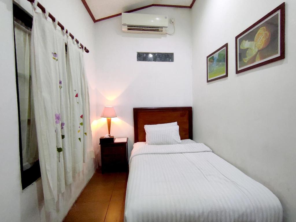 Omah Kebon Guest House - Eenpersoonskamer