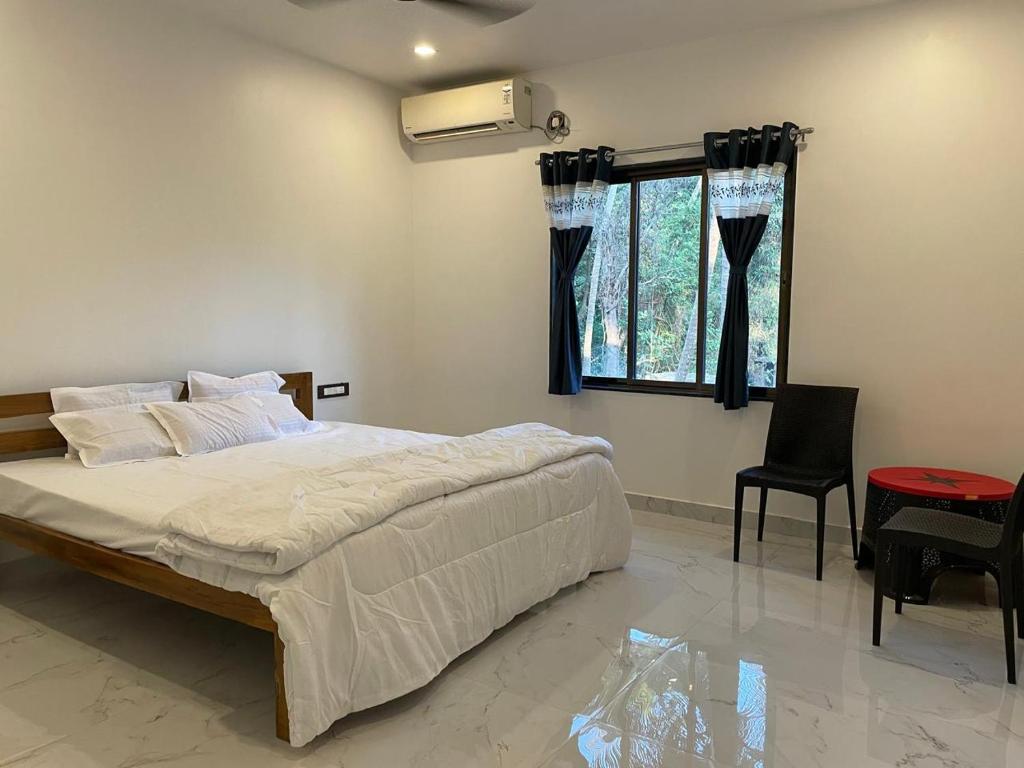 Postel nebo postele na pokoji v ubytování Danny's Guest House