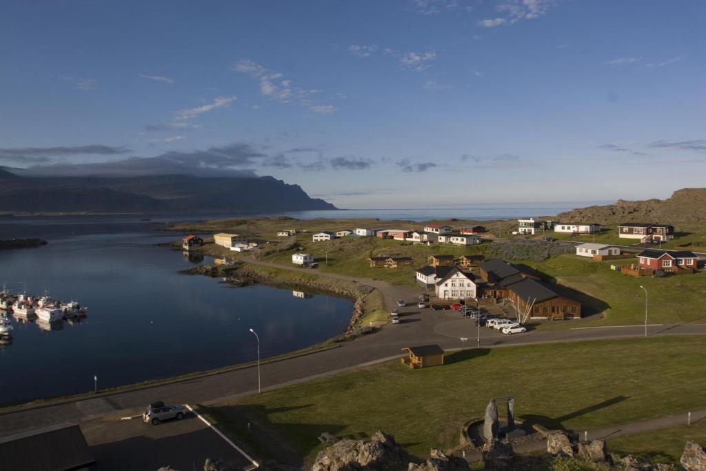 a view of a town with a body of water at Hotel Framtid in Djúpivogur