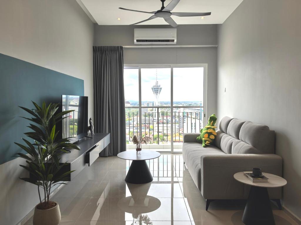 Χώρος καθιστικού στο D Aman Infinity Pool and AS Tower View Homestay 06