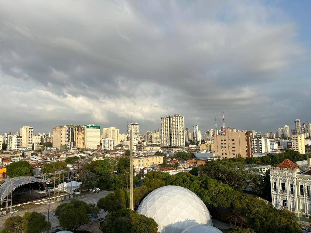 a view of a city with tall buildings at Cantinho da Bandeira in Belém