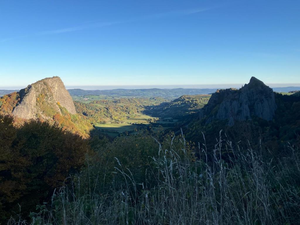 a view from the top of a mountain at CAMPING de la BUGE in Rochefort-Montagne