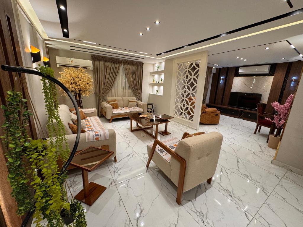 Χώρος καθιστικού στο شقة فندقية فاخرة الدقي 4 غرف نوم Dokki 4 Bedroom Luxury Hotel Apartment