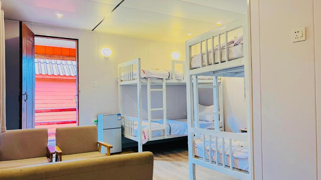 Postel nebo postele na pokoji v ubytování Umi Resort 菩提有米