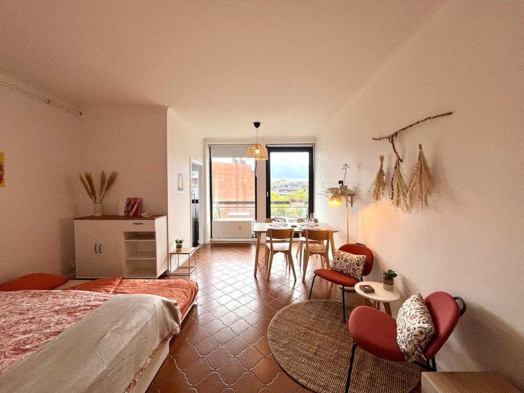 Ένα ή περισσότερα κρεβάτια σε δωμάτιο στο Avenue Rogier