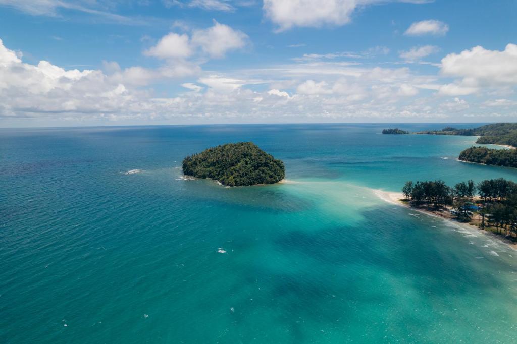 an island in the middle of the ocean at Kudat Riviera Exclusive Beach Villas in Kudat