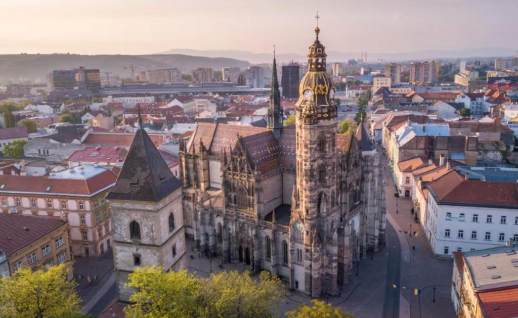 an aerial view of a city with a clock tower at Lovely flat in a great location in Košice