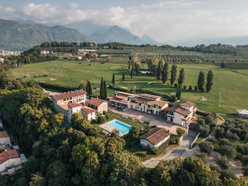 an aerial view of a villa with a large estate at Il Colombaro in Salò