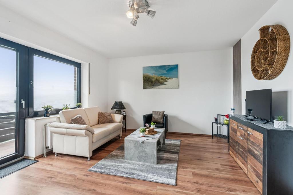 TV a/nebo společenská místnost v ubytování Monteur Wohnung Bedburg-Hau BH01