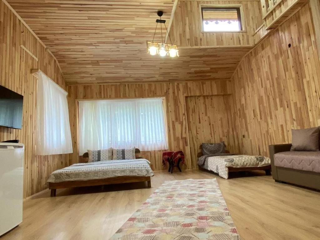 Postel nebo postele na pokoji v ubytování Gold Boutique Apart & Hotel