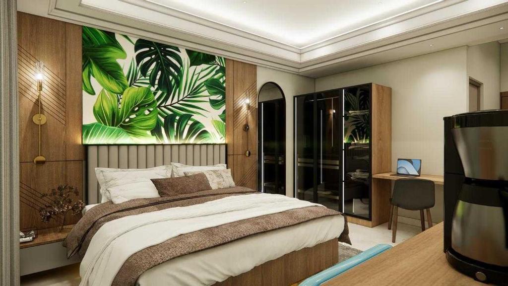 Ένα ή περισσότερα κρεβάτια σε δωμάτιο στο Townhouse Oak Dharwad New Bus Terminal Formerly Hotel Aditya Inn