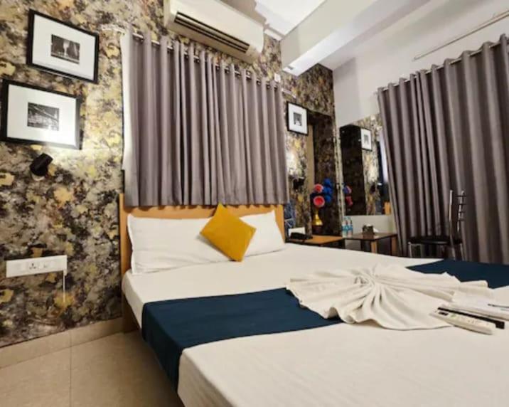 Postel nebo postele na pokoji v ubytování hotel Prime Plaza Newtown