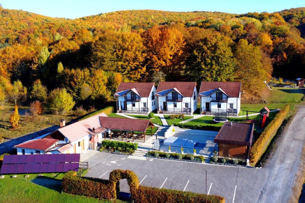 an aerial view of a house with a yard at Pallos Apartments in Sovata