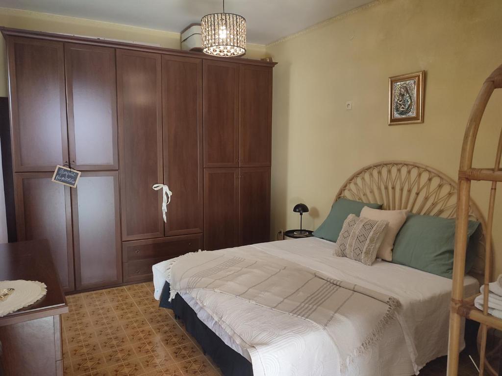 Ένα ή περισσότερα κρεβάτια σε δωμάτιο στο Il Nido Karino