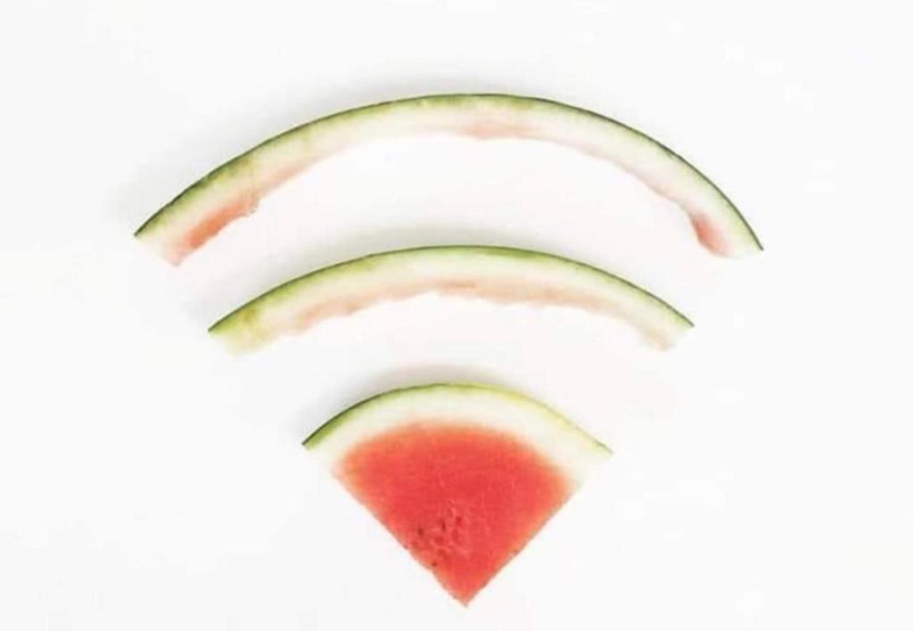 a tomato cut in half on a white background at Gold Glass z Jacuzzi &Sauną Rynek Centrum in Kielce