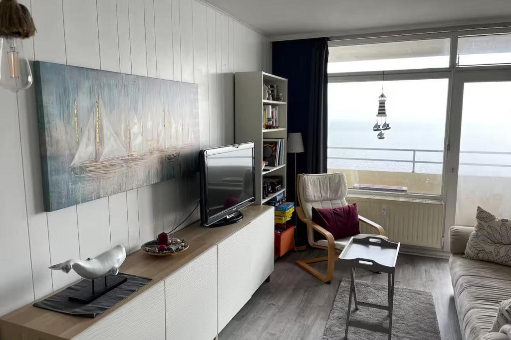 TV a/nebo společenská místnost v ubytování Vier Jahreszeiten - Haus 3 Wohnung 86