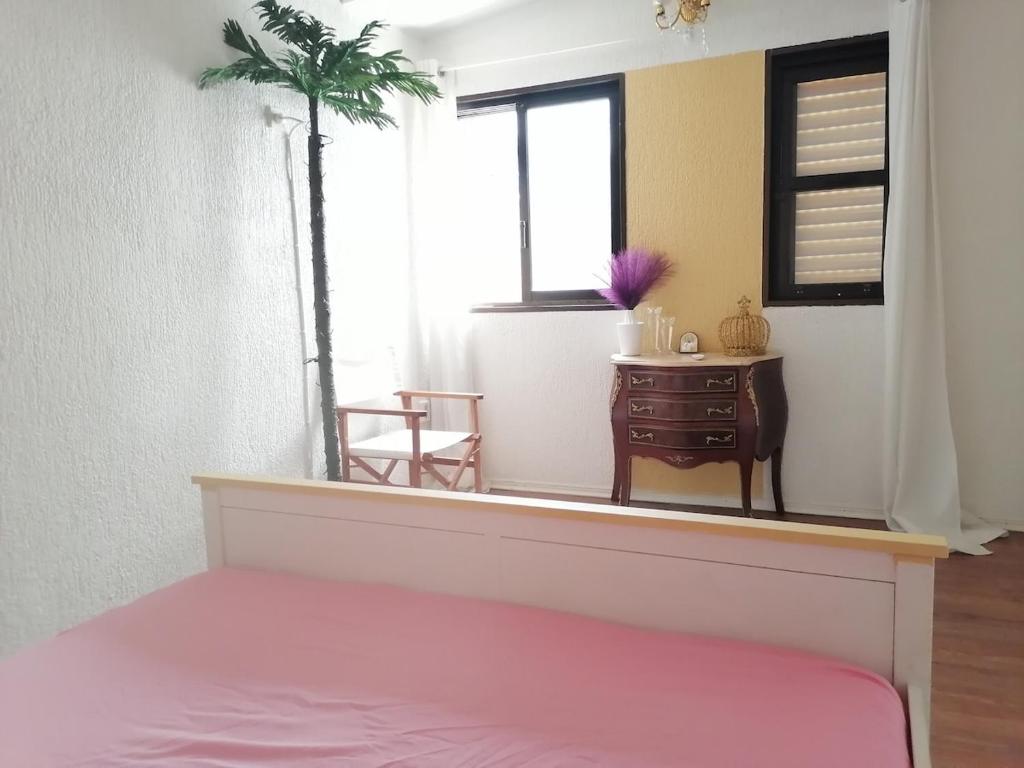 Ένα ή περισσότερα κρεβάτια σε δωμάτιο στο Roof Top appartement with huge Terrace