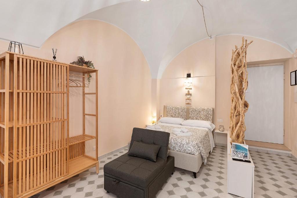 Postel nebo postele na pokoji v ubytování La Tana Dei Marinai