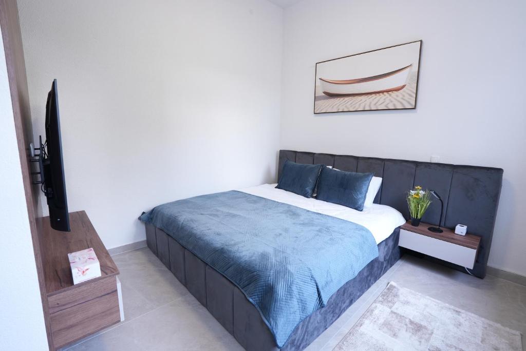 Ένα ή περισσότερα κρεβάτια σε δωμάτιο στο Wohnung IA - Modern & Elegant