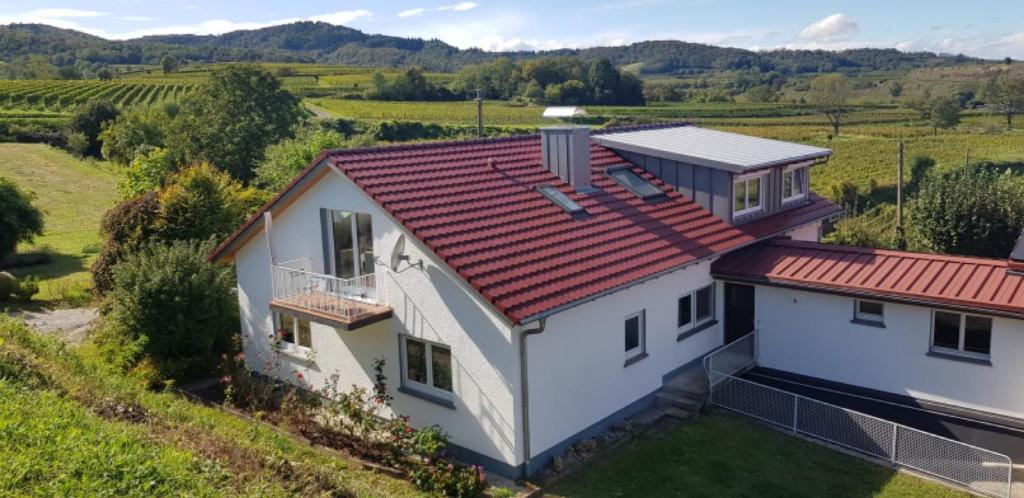 an aerial view of a house with a red roof at Ferienhaus Engelsberghof in Endingen