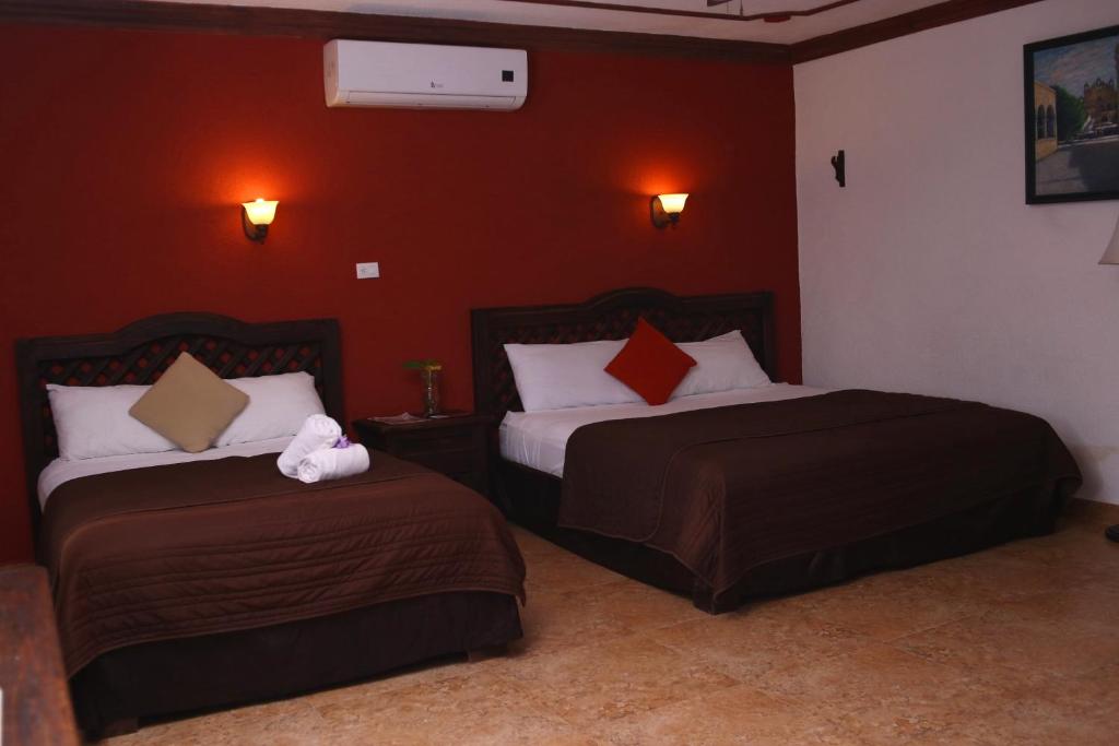 Postel nebo postele na pokoji v ubytování Hotel Rinconada del Convento