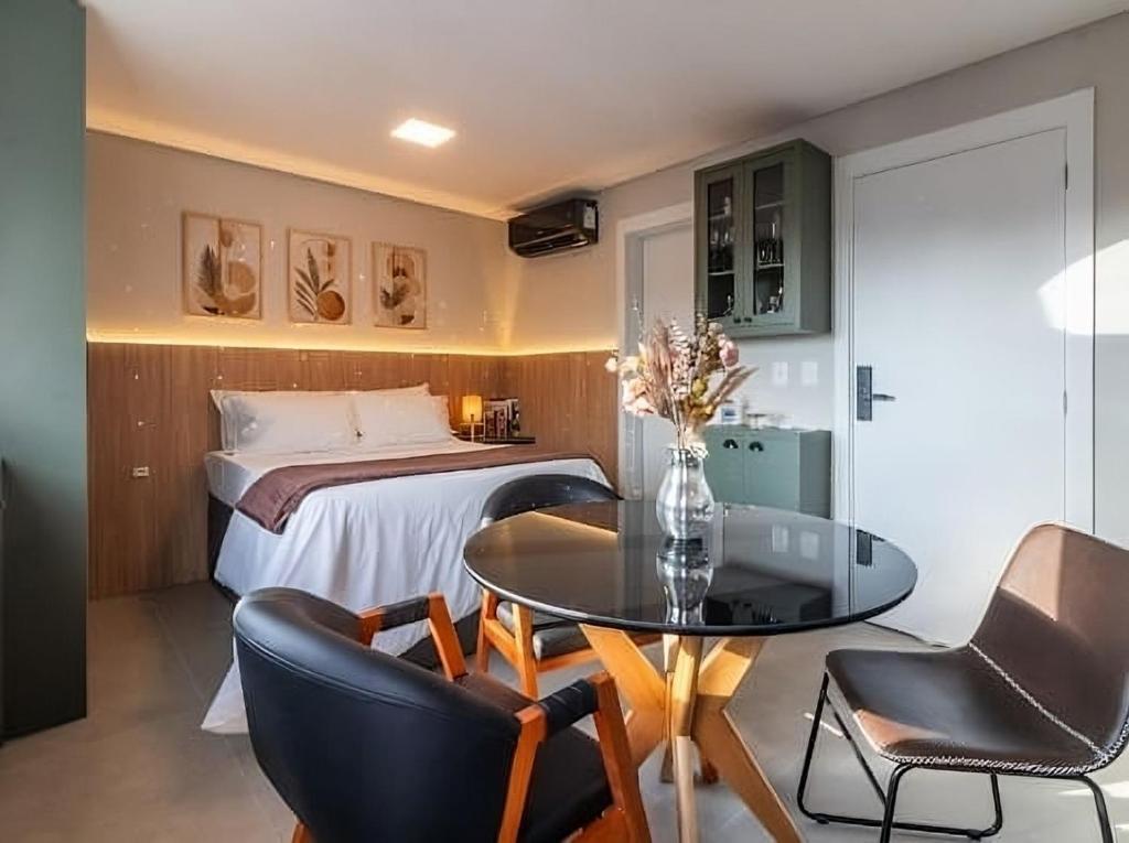 En eller flere senge i et værelse på 1106 - Vila Germânica