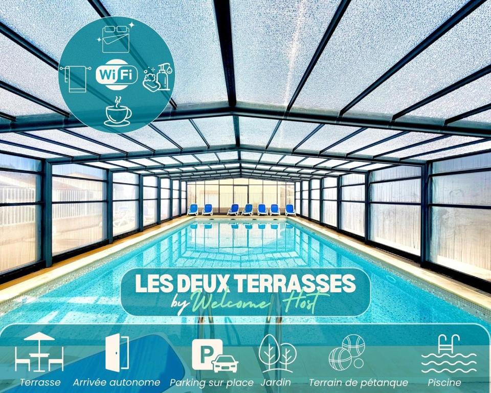 a swimming pool with a sign that readsles derryn terrazes at Les Deux Terrasses, 6 pers Piscine à Calvisson in Calvisson