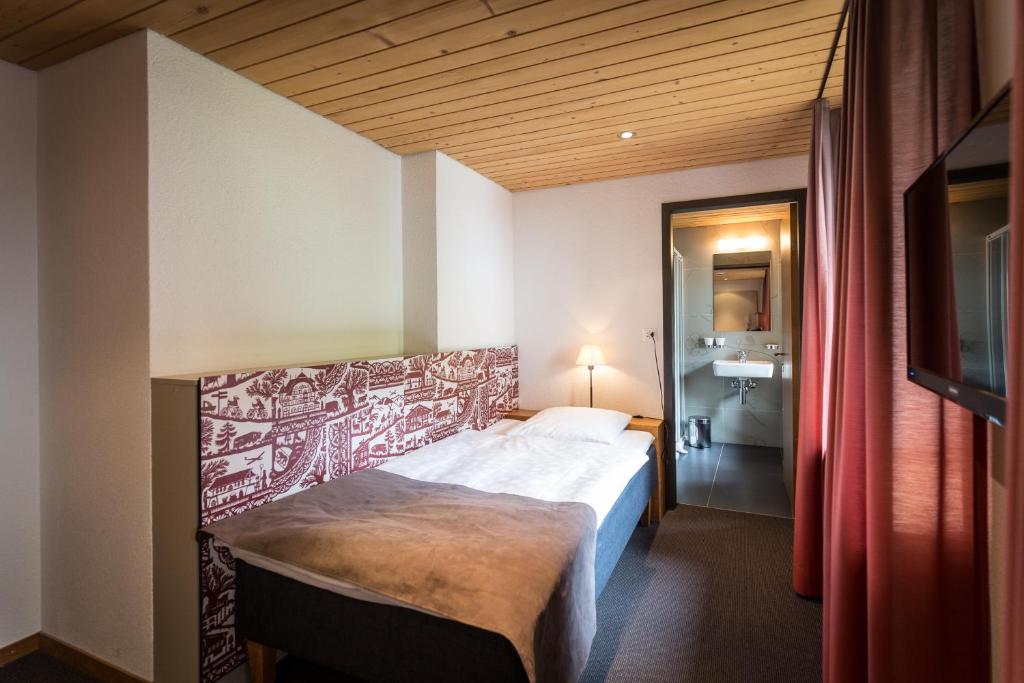 Postel nebo postele na pokoji v ubytování Hotel Landhaus