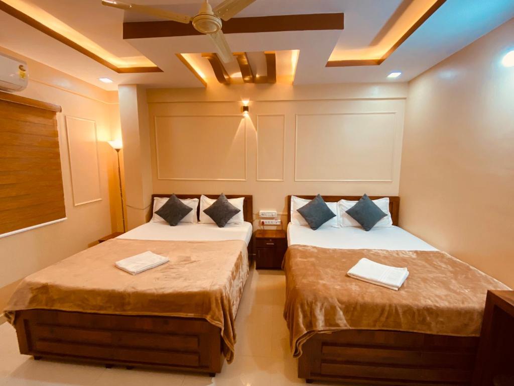 Ένα ή περισσότερα κρεβάτια σε δωμάτιο στο AL MANAL 302 Premium Rooms