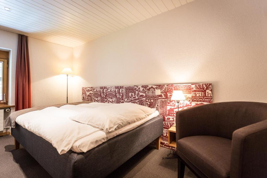 Postel nebo postele na pokoji v ubytování Hotel Landhaus